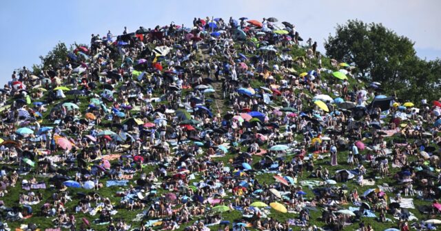 Fans swarm hill in Munich, claiming a high perch for watching Taylor Swift concert for free