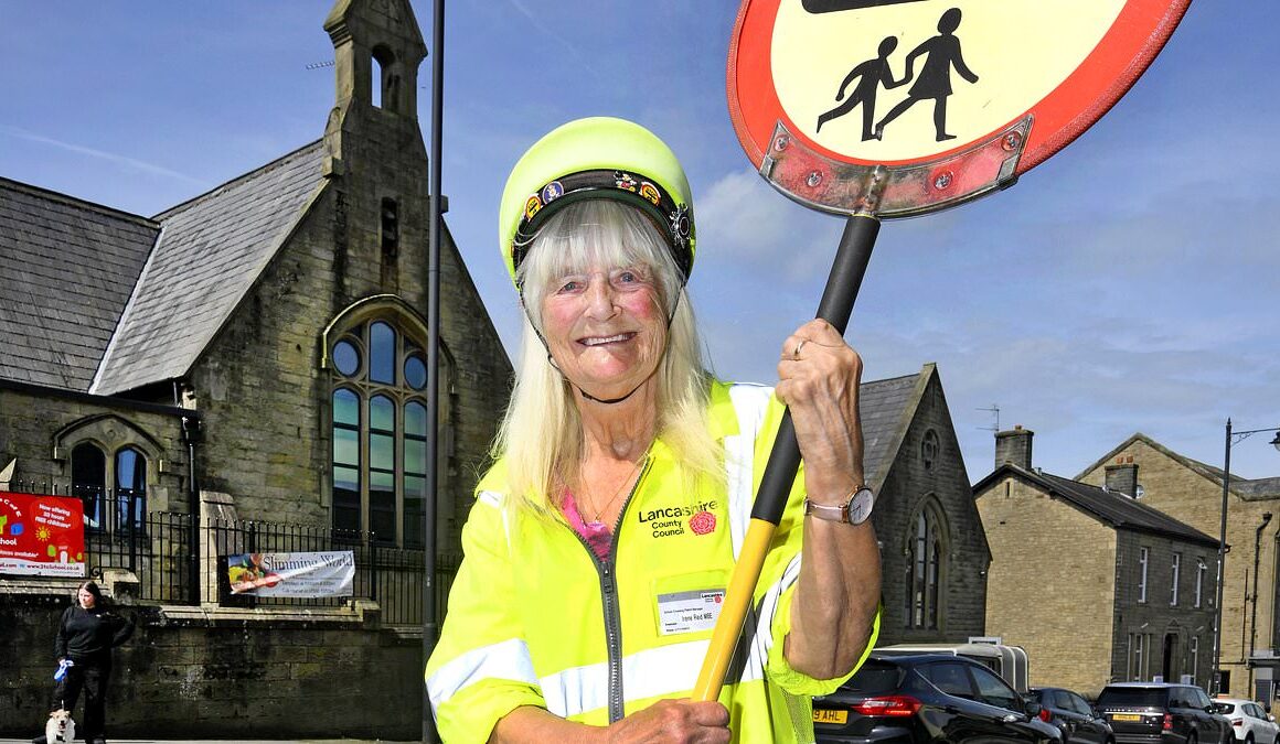 Meet the UK’s longest-serving lollipop lady, 84, who is still helping kids cross the road after 55 years