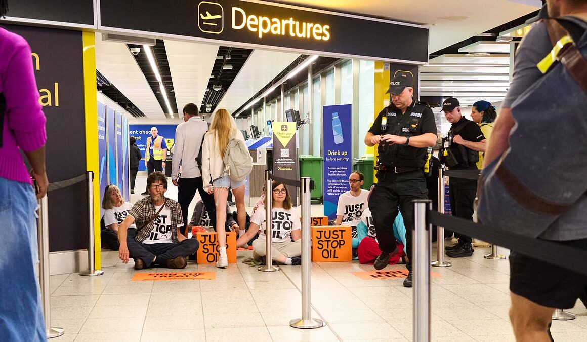 Just Stop Oil eco idiots trying to unleash ‘summer of chaos’ by blocking Gatwick Airport departure gate are arrested – as ‘pathetic’ stunt is mercilessly mocked after passengers simply stepped over them