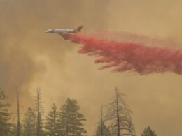 California firefighters make progress as wildfires push devastation and spread smoke across US West