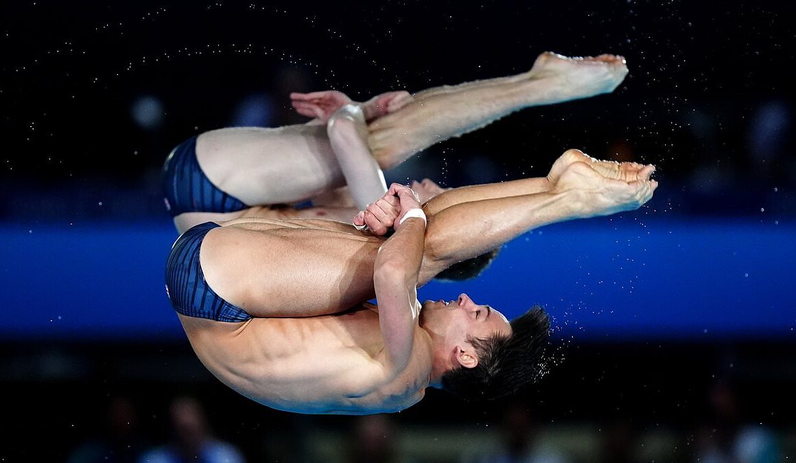 The comeback kid! Tom Daley, 30, wins FIFTH Olympic medal as he clinches silver in 10m synchronised diving final after reversing his retirement – as his proud husband, mother and two children cheer him on