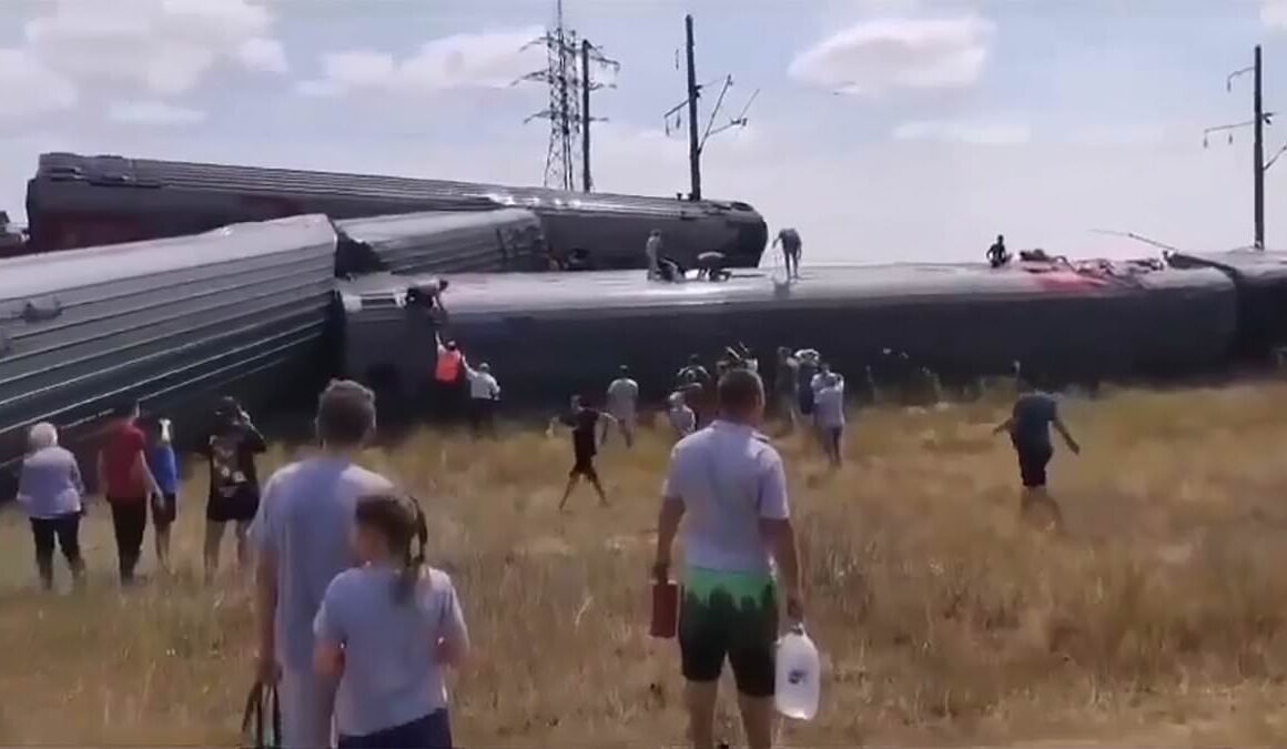 Train crashes into truck on railway crossing, killing two and injuring 100 in Russia