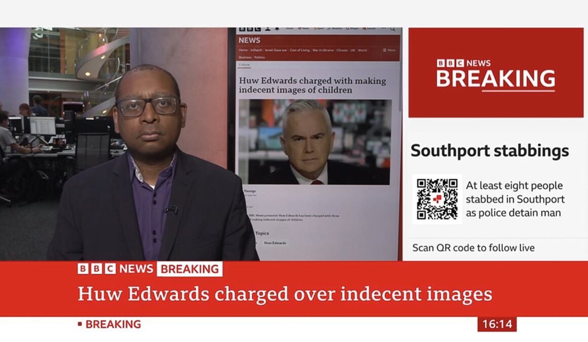 Moment BBC News presenters report their former colleague Huw Edwards has been charged with possession of indecent images