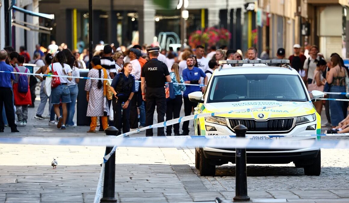 Bath emergency incident: Two people are taken to hospital after a woman ‘approached them with a bag’ as police crews in hazmat suits lock down city centre after shoppers were left with breathing difficulties and itchy eyes