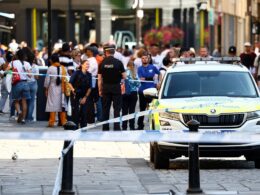 Bath emergency incident: Two people are taken to hospital after a woman ‘approached them with a bag’ as police crews in hazmat suits lock down city centre after shoppers were left with breathing difficulties and itchy eyes