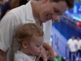 Moment Tom Daley is nearly soaked in fruit juice by his one-year-old son Phoenix after winning silver at the Paris Olympics