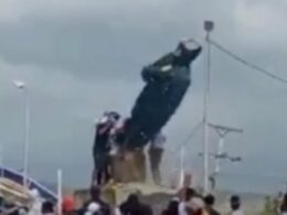 Venezuelan activists topple Hugo Chavez statue amid violence over the country’s disputed presidential election