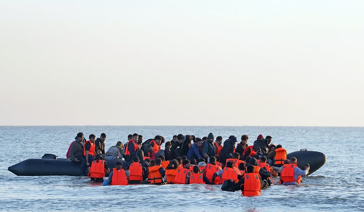 English Channel migrant crossings hit record high, figures show – as one person about to embark on the dangerous journey shouts: ‘This is for Rishi Sunak’ after Labour axed his Rwanda plan