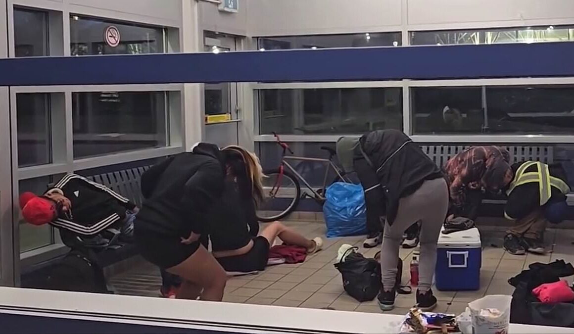 Terrifying video shows ‘zombie’ drug addicts sheltering in Alberta bus station just hours before school children arrive in scenes hauntingly similar to The Walking Dead