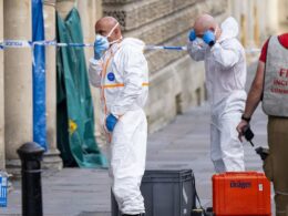 Woman, 73, is arrested on suspicion of administering noxious substance after shoppers fell ill in Bath sparking five-hour city centre lockdown