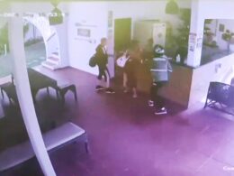 Terrifying moment British tourist is seriously wounded and his girlfriend is shot dead in Brazil hotel lobby as gunman tries to rob them