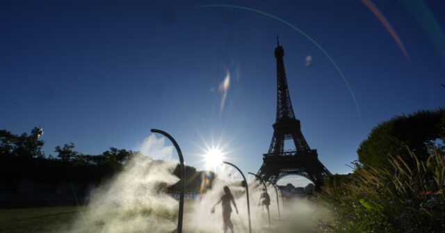 Paris Olympics brings out hoses and misters to cool down fans during heat wave