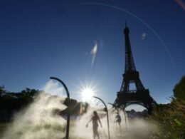 Paris Olympics brings out hoses and misters to cool down fans during heat wave