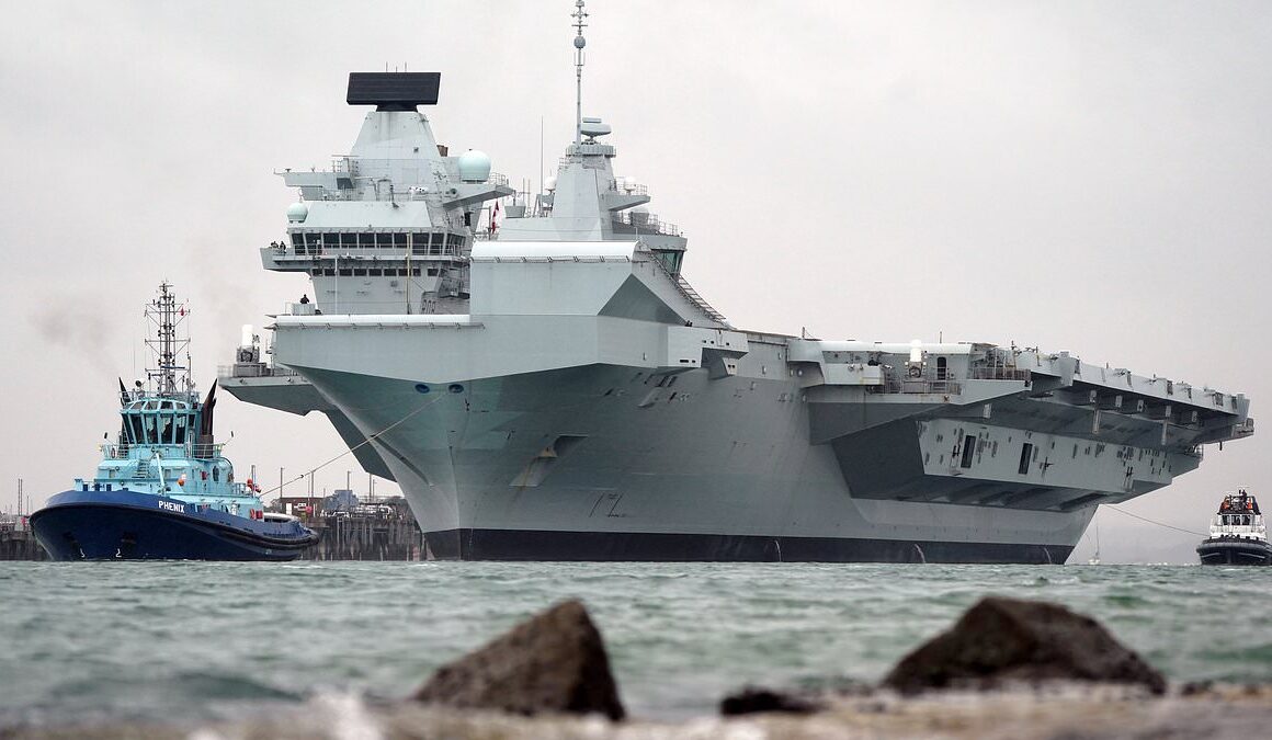 Britain’s ‘cursed’ state-of-the-art £3.5billion aircraft carrier HMS Queen Elizabeth arrives back in Portsmouth after repairs that left her in a dry dock for months