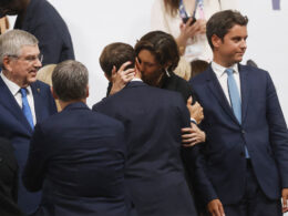 Macron’s Olympic Kiss With Sports Minister Raises Eyebrows in France