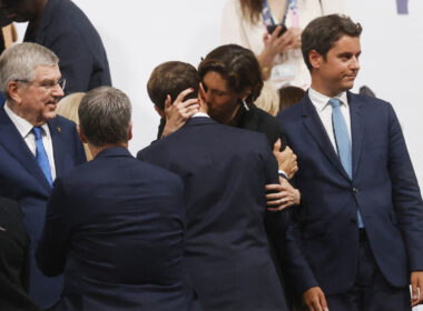 Macron’s Olympic Kiss With Sports Minister Raises Eyebrows in France