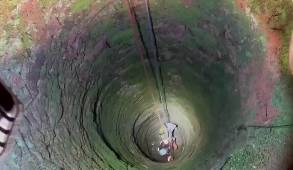 Horror as man falls down very deep well while looking for his phone in dark woods