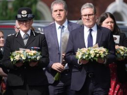 Moment Sir Keir Starmer is heckled on his visit to Southport and asked ‘how many more children will die?’ after three girls were killed in knife rampage at Taylor Swift dance class