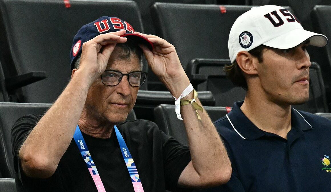 Bill Gates is seen watching women’s Olympic gymnastics as new book details his devastating links to Jeffery Epstein