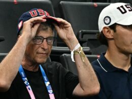 Bill Gates is seen watching women’s Olympic gymnastics as new book details his devastating links to Jeffery Epstein