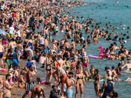 Brighton, not Benidorm! Families enjoy day out at jam-packed beaches as UK records hottest day of the year with a scorching 32C – but summer fun may be short-lived