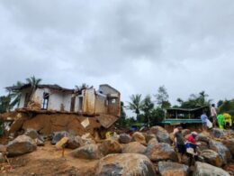 Rescuers search through mud and debris as deaths rise to 151 in landslides in southern India