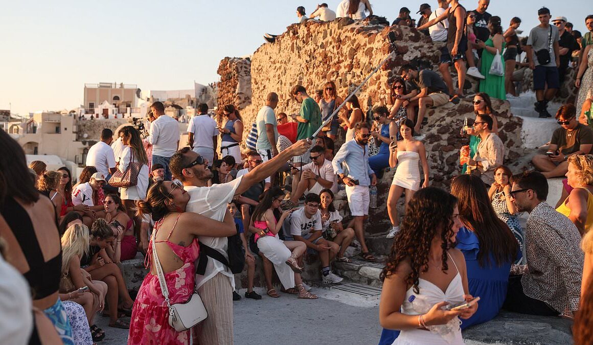 Furious Santorini locals threaten to LEAVE Greek island after officials told them to keep out of tourists’ way