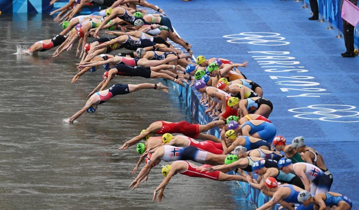 Paris Olympics: Triathletes Swim In Seine River After Weeks Of Concerns About Polluted Waters (Photos)