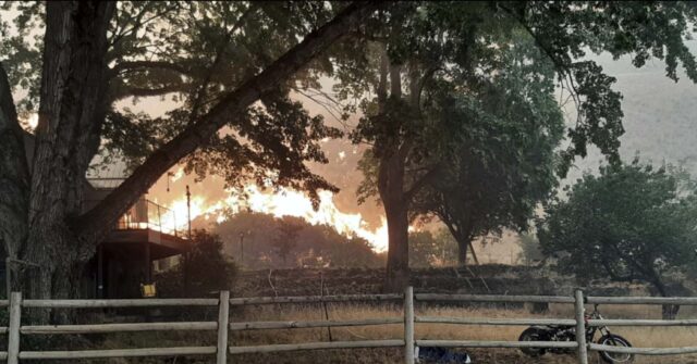 Wildfires prompt California evacuations as crews battle Oregon and Idaho fires stoked by lightning