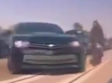 Horror moment speeding biker gets smashed by car crossing double lines