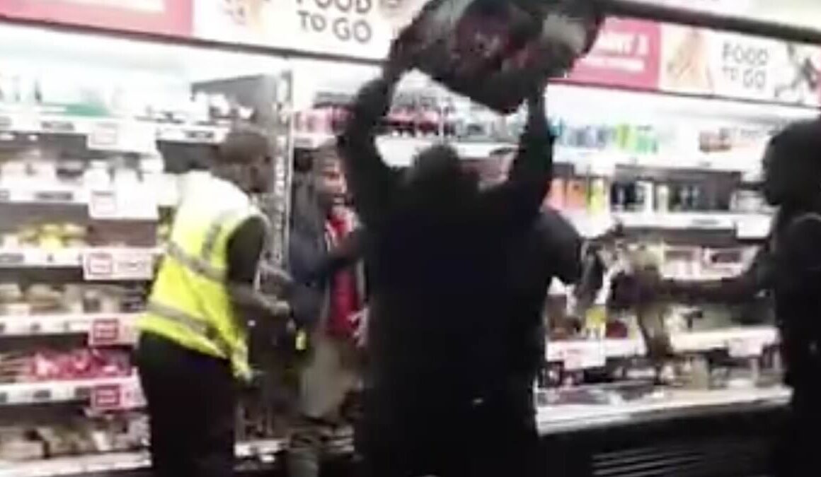 Moment suspected thief is cornered by a horde of angry Asda workers after allegedly trying to steal from the shop