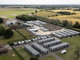 Four asylum seekers sue the Home Office over ‘prison-like’ conditions at ex-RAF base used to house migrants