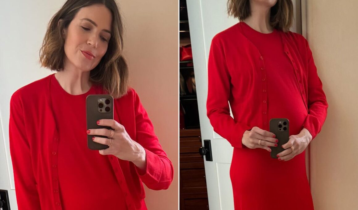 Pregnant Mandy Moore Posts Photo of Her Growing Baby Bump in Cute Red Dress: ‘There She Is’