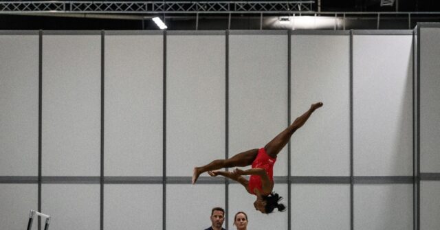 Olympics a homecoming for coaching duo backing Biles in Paris