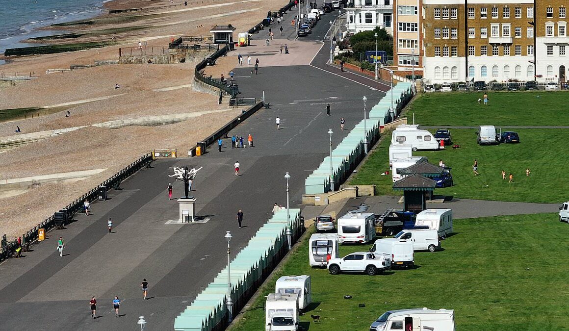 Travellers park up their convoy of caravans and motorhomes at illegal encampment on Hove seafront after being moved on twice in last week