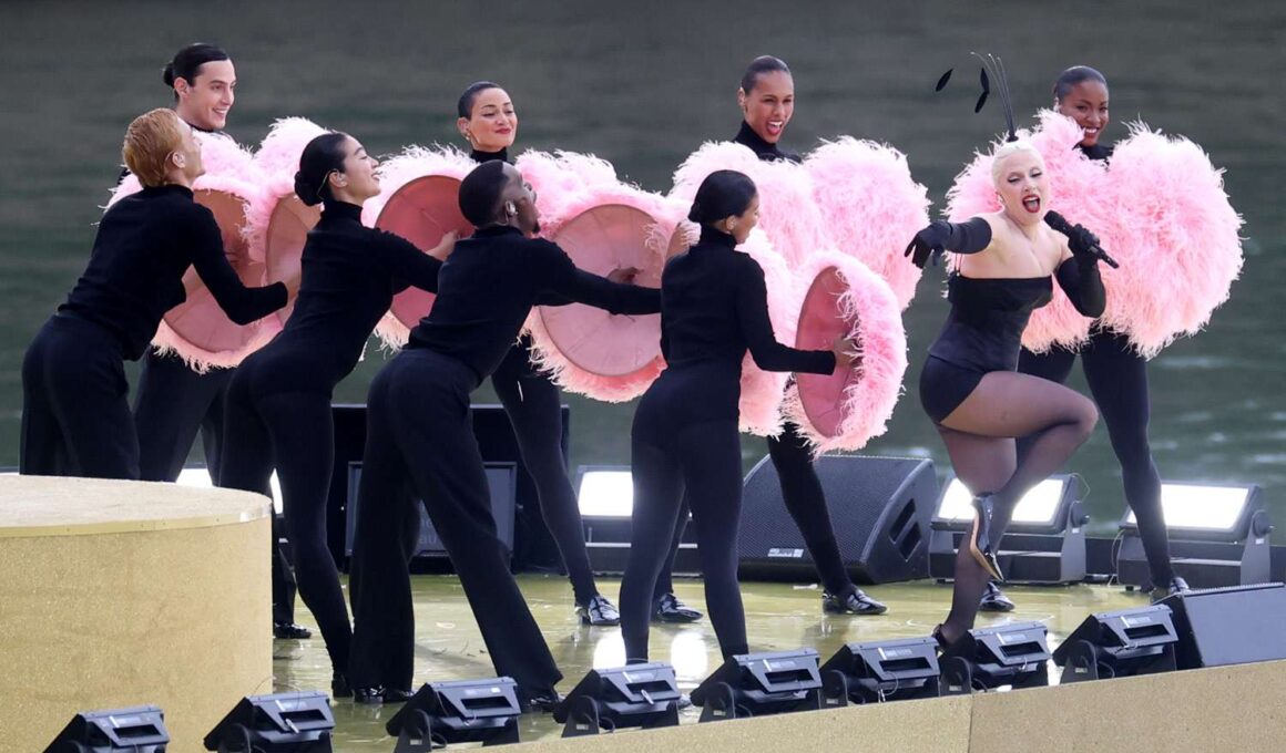 Lady Gaga Goes Full Cabaret Girl in Corset and All the Feathers for 2024 Olympics Opening Ceremony Performance