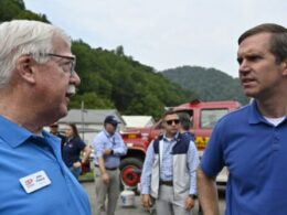 Beshear gets a warm embrace in flood-stricken parts of Kentucky where he and Trump are both popular