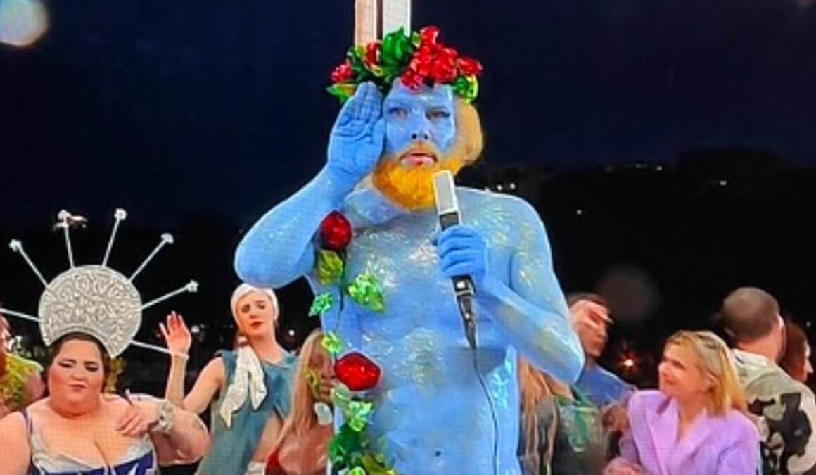 Most unusual star of Paris Olympics Opening Ceremony who appeared naked painted blue and served on a platter of fruit is revealed as beloved actor and singer