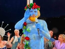 Most unusual star of Paris Olympics Opening Ceremony who appeared naked painted blue and served on a platter of fruit is revealed as beloved actor and singer