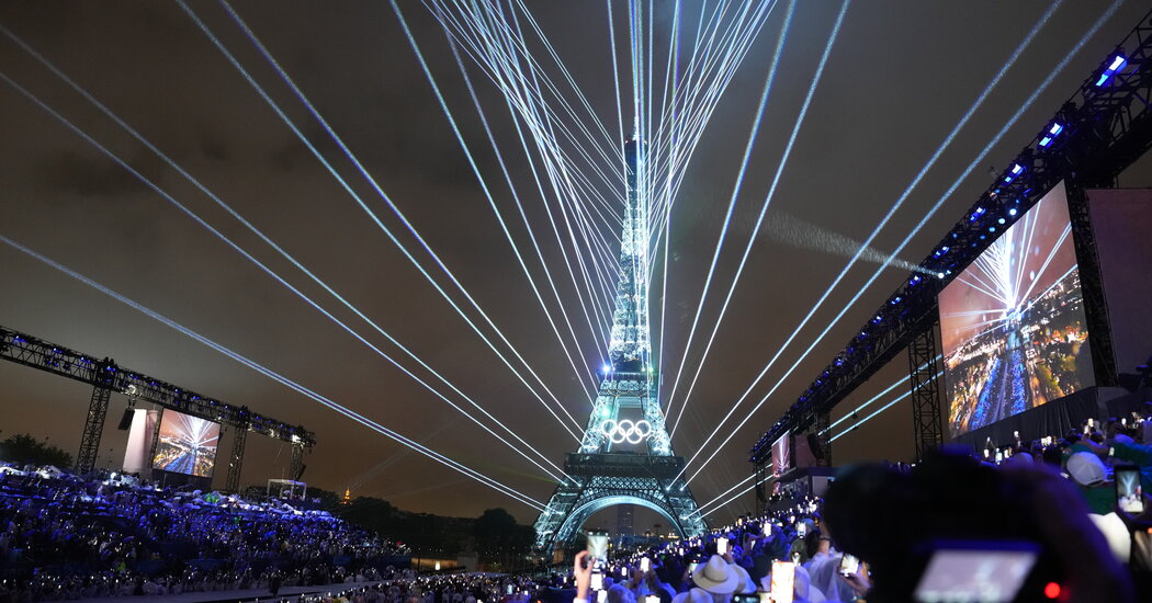 Doused by Rain, Paris Opens Its Games With a Boat Party on the Seine