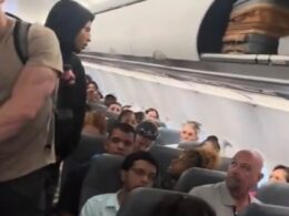 Ugly spat breaks out aboard Frontier Airlines flight to Atlanta as man and woman taunt each other for bizarre reason: ‘Show me a band!’