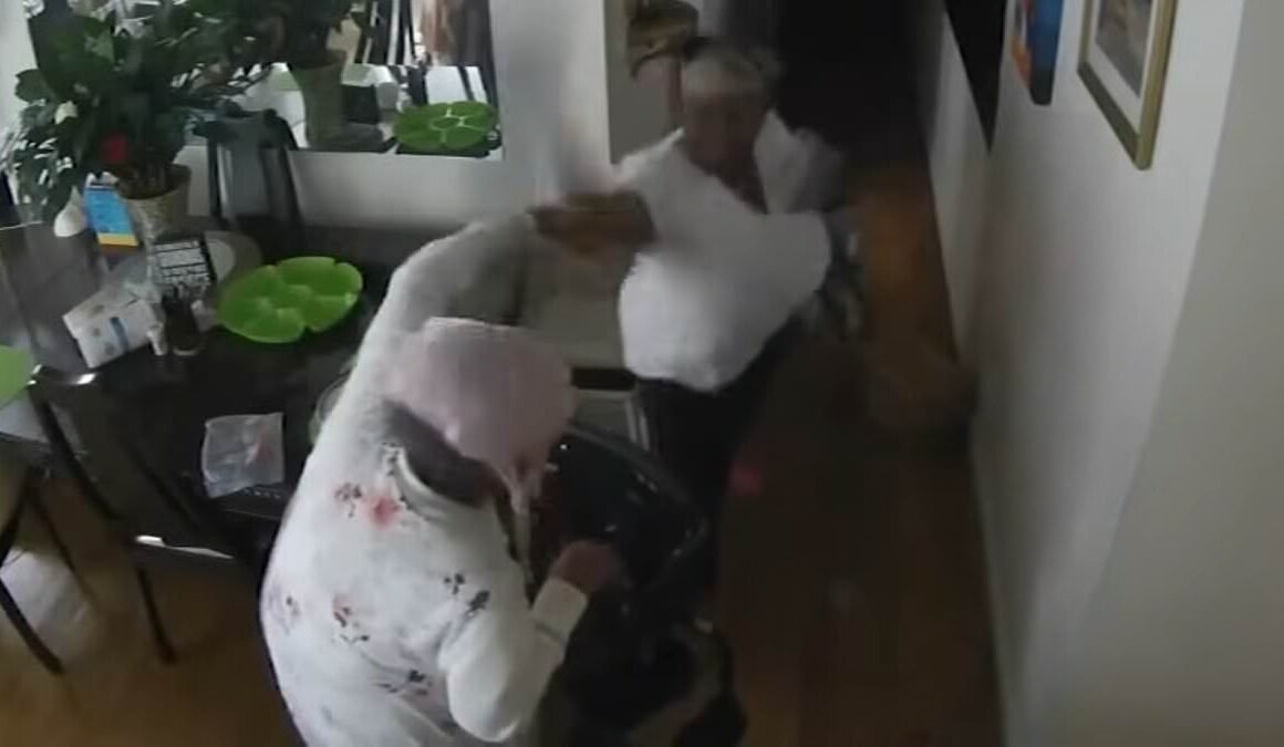 Home aide batters 95-year-old grandmother over the head with a saucepan until she collapses in her New York City home – while her horrified family watched the attack unfold on cameras