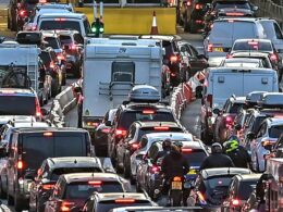 Stay at home! Queues build at Dover, 3.6million cars hit the road and Eurostars are still axed as families are urged to rethink their plans on busiest travel day of the year