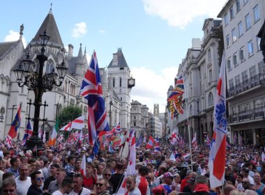 Thousands fill central London for Tommy Robinson rally amid chants of ‘We want our country back’ as Met police flood streets with 1,000 officers to keep the peace as capital with anti-racism counter-protest and Trans Pride event also due