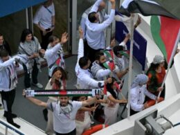 Palestinian Olympian wore shirt showing bombed children at opening ceremony