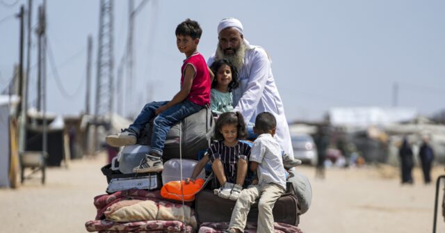 An Israeli airstrike hits a school sheltering people in Gaza, killing at least 30 including children