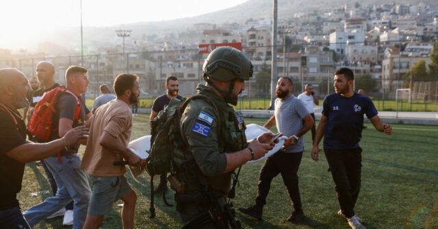 Deadly strike at Gaza school, rocket kills 12 in Israeli-annexed Golan