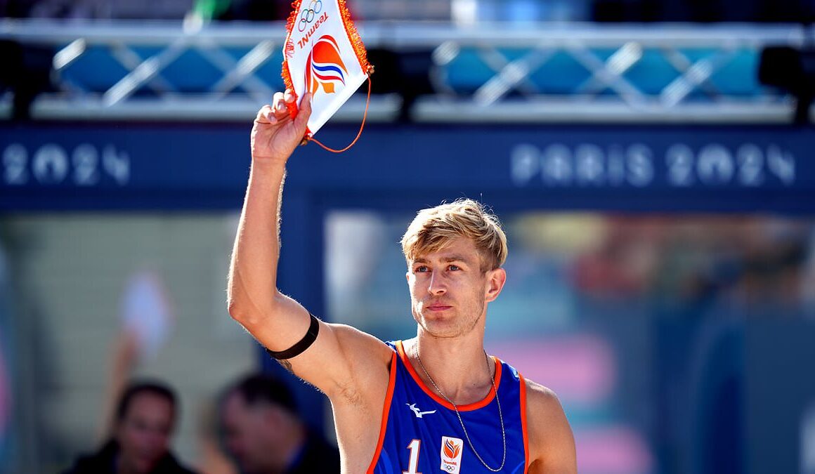 BREAKING NEWSDutch child rapist Steven van de Velde is BOOED as he kicks off first Olympics beach volleyball match – after furious backlash over sex offender’s inclusion