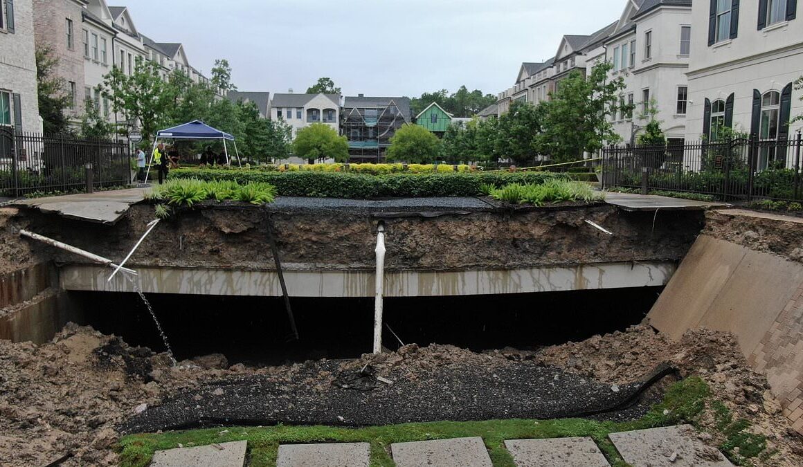 Million-dollar homes evacuated after huge sink hole opens up in luxury gated community in Houston