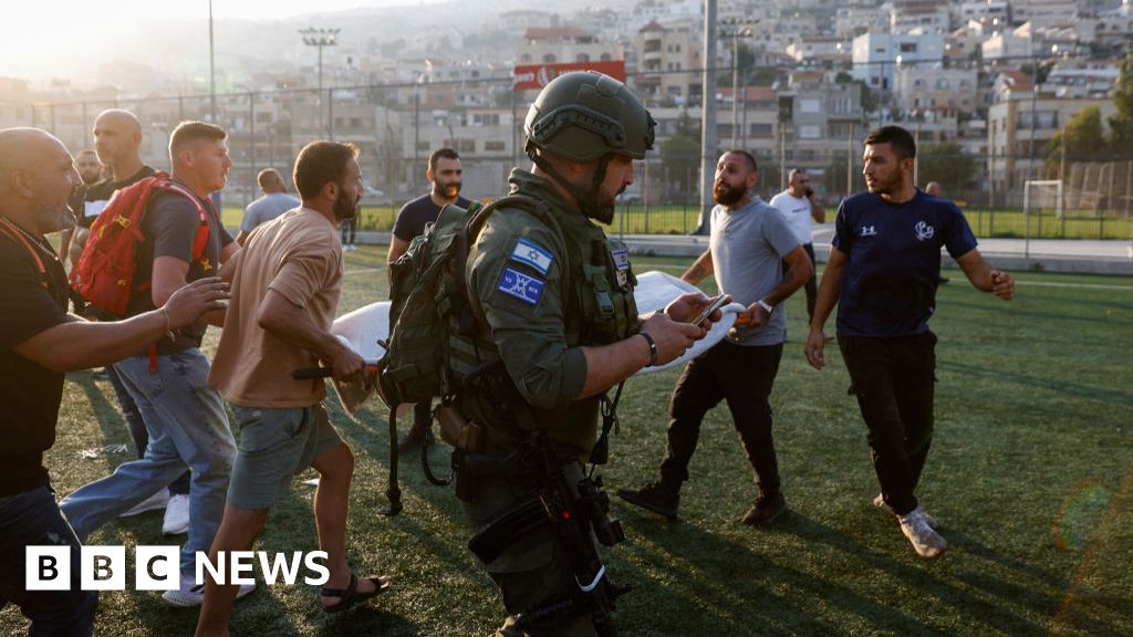 Israel hits Hezbollah targets after football pitch strike kills 12 young people